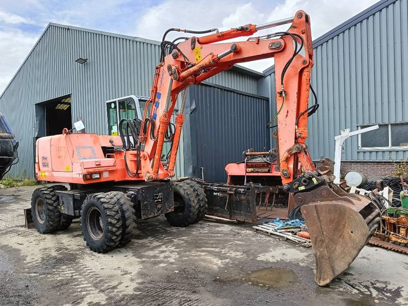FIAT-HITACHI FH120W bandenkraan Wheel Excavator graafmachine - Riteņu ekskavators: foto 2 FIAT-HITACHI FH120W bandenkraan Wheel Excavator graafmachine - Riteņu ekskavators: foto 2