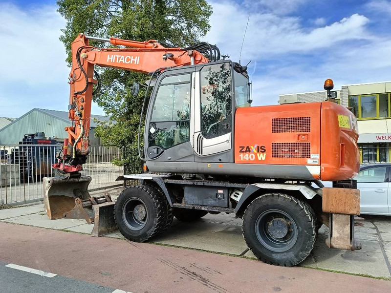 Hitachi ZX 140 W-3 mobiele graafmachine mobile excavator - Riteņu ekskavators: foto 1 Hitachi ZX 140 W-3 mobiele graafmachine mobile excavator - Riteņu ekskavators: foto 1