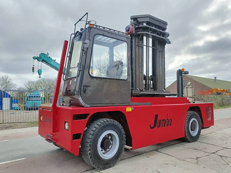 Jumbo J/SH 120/14/75 zijlader side forklift stapler 12 T - Sānu autokrāvējs: foto 1 Jumbo J/SH 120/14/75 zijlader side forklift stapler 12 T - Sānu autokrāvējs: foto 1
