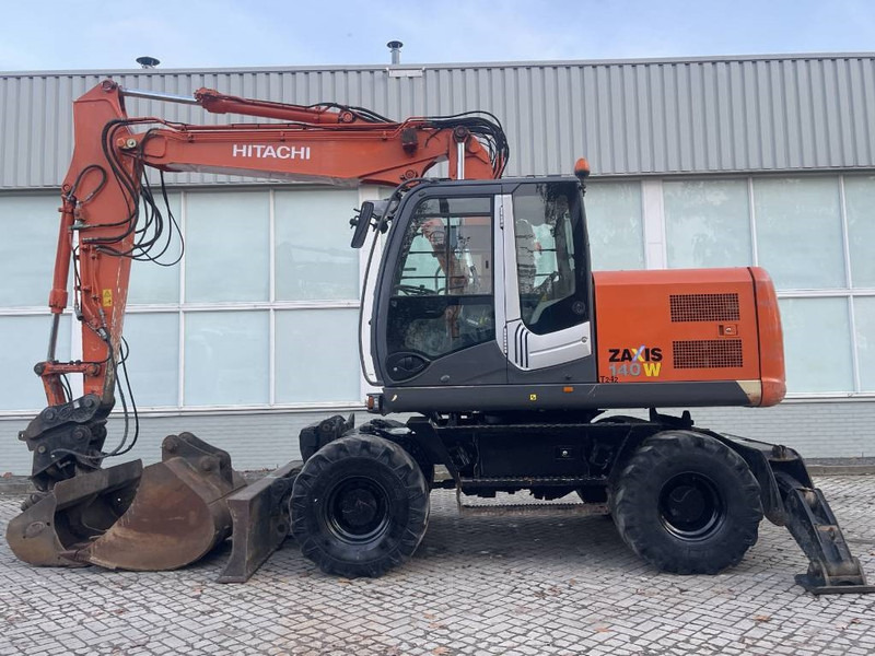 Hitachi ZX 140 W-3 - Riteņu ekskavators: foto 4 Hitachi ZX 140 W-3 - Riteņu ekskavators: foto 4