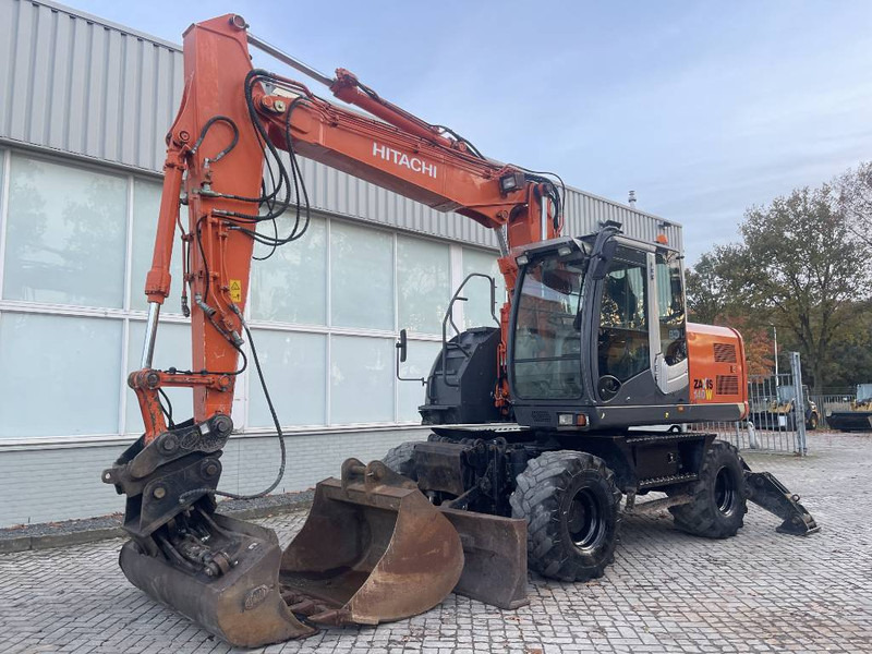 Hitachi ZX 140 W-3 - Riteņu ekskavators: foto 1 Hitachi ZX 140 W-3 - Riteņu ekskavators: foto 1