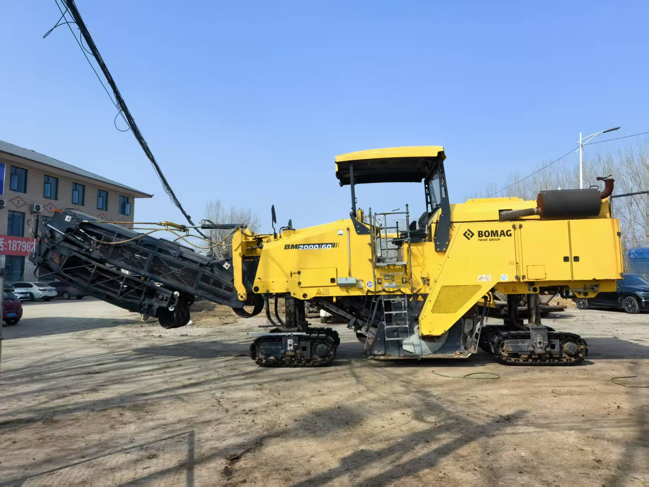 BOMAG Second Hand Asphalt Milling Machine BM2000/60 Asphalt Cold Milling Machine Price - Asfalta frēze: foto 2 BOMAG Second Hand Asphalt Milling Machine BM2000/60 Asphalt Cold Milling Machine Price - Asfalta frēze: foto 2