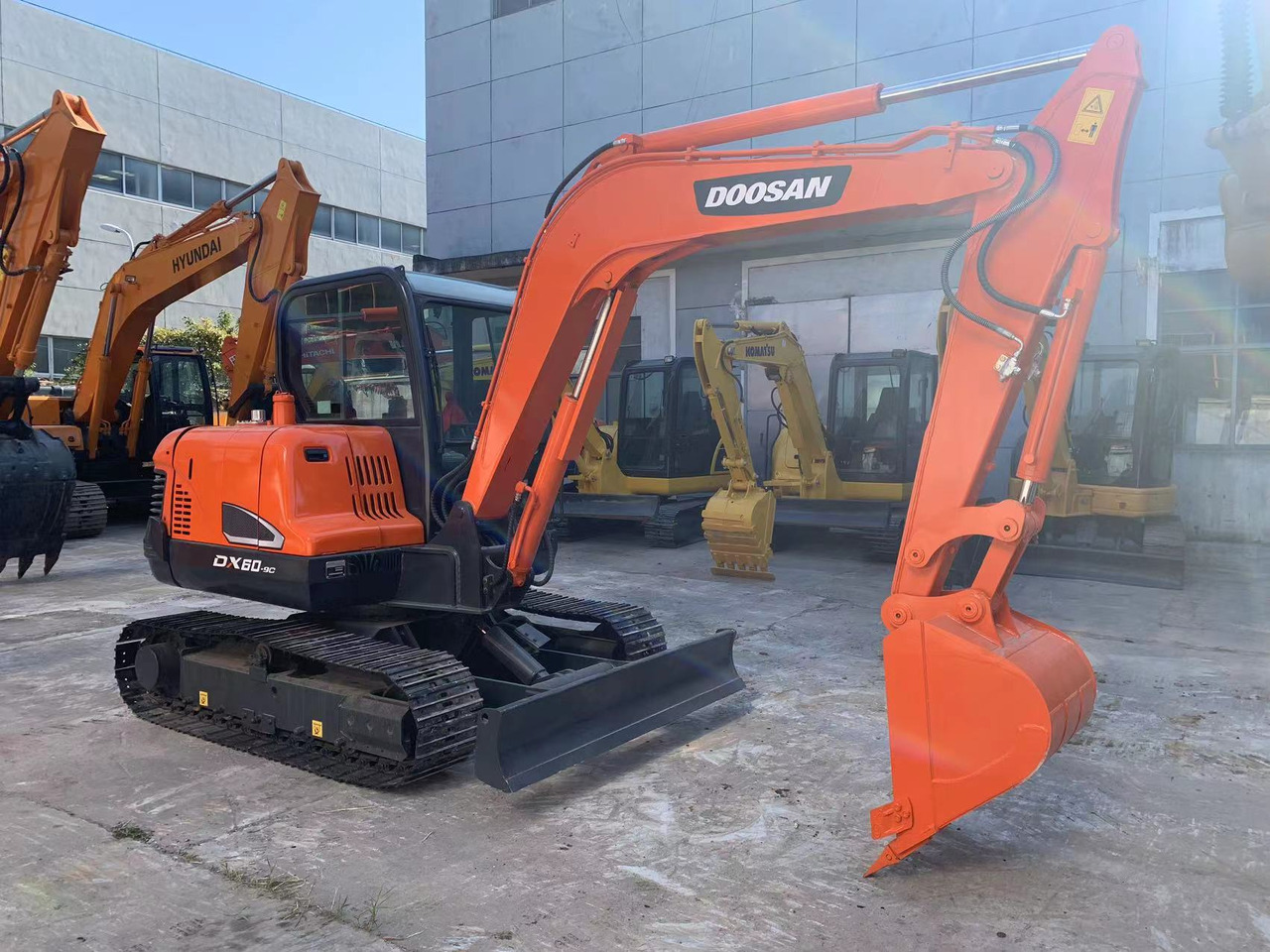 DOOSAN Mini Excavator Doosan DX60, DX55 - Kāpurķēžu ekskavators: foto 3 DOOSAN Mini Excavator Doosan DX60, DX55 - Kāpurķēžu ekskavators: foto 3