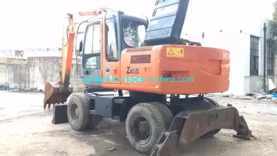 Good Price Slightly Used Japanese Wheel Excavator Hitachi Zx130W Moving by Tyres for Sale - Riteņu ekskavators: foto 1 Good Price Slightly Used Japanese Wheel Excavator Hitachi Zx130W Moving by Tyres for Sale - Riteņu ekskavators: foto 1
