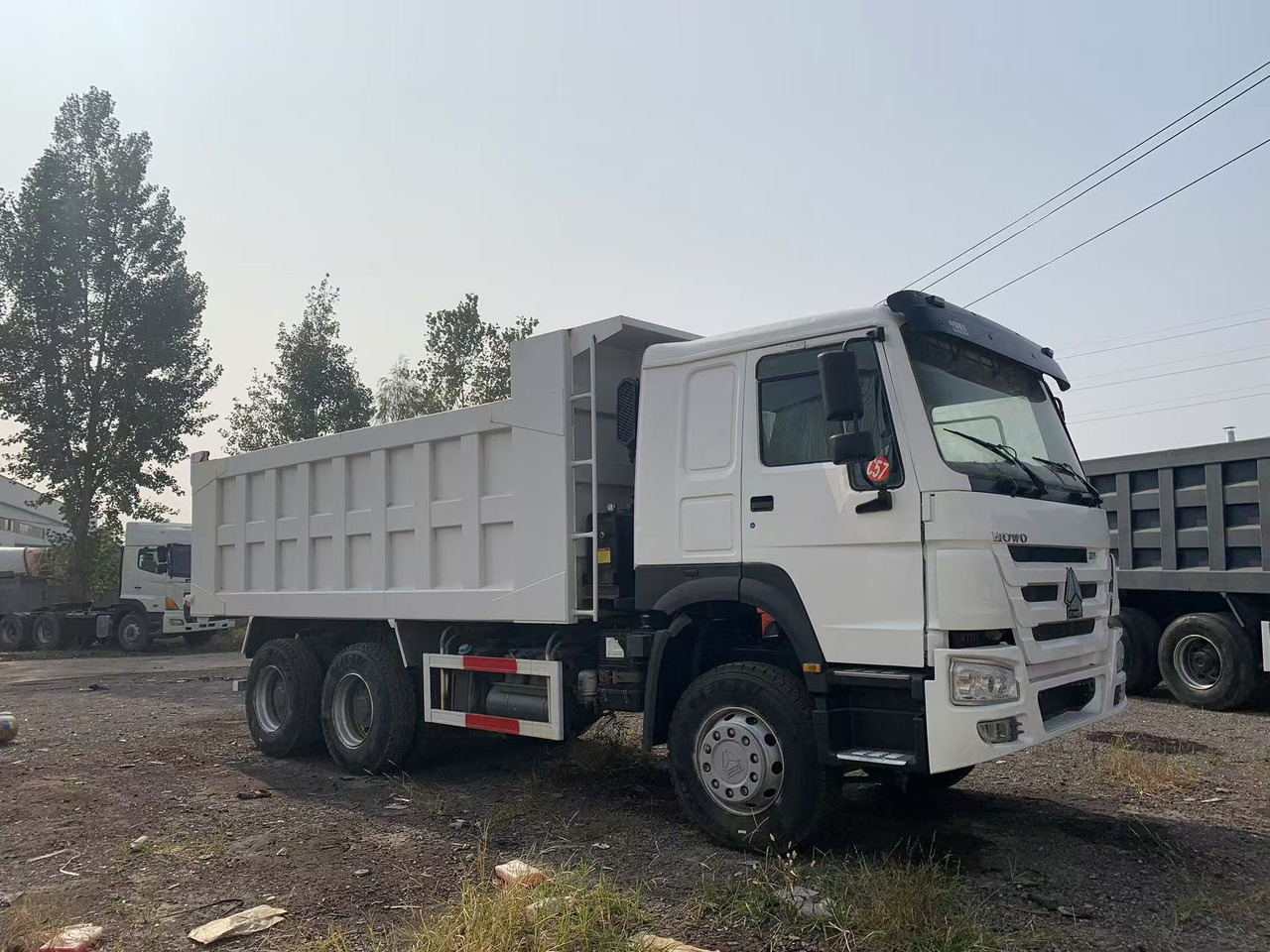 Howo Secondhand Commercial Vehicle 10-wheels HOWO Dumper Truck 6x4 Left Hand Drive Tipper Truck - Kravas automašīna pašizgāzējs: foto 4 Howo Secondhand Commercial Vehicle 10-wheels HOWO Dumper Truck 6x4 Left Hand Drive Tipper Truck - Kravas automašīna pašizgāzējs: foto 4