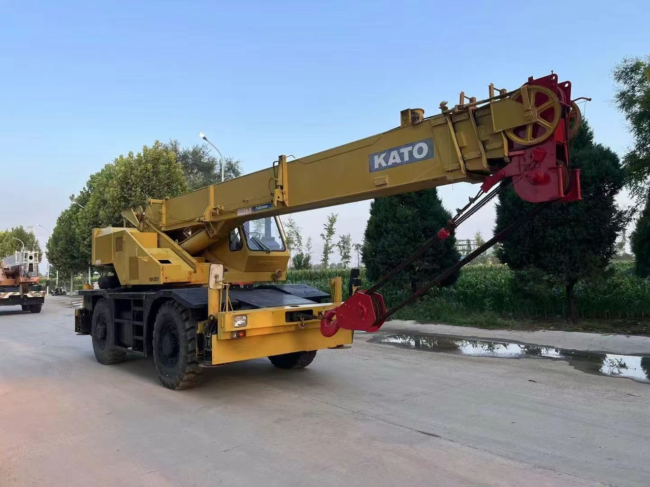 KATO KR250 Good Price 25 ton Rough Terrain Crane - Autoceltnis: foto 1 KATO KR250 Good Price 25 ton Rough Terrain Crane - Autoceltnis: foto 1