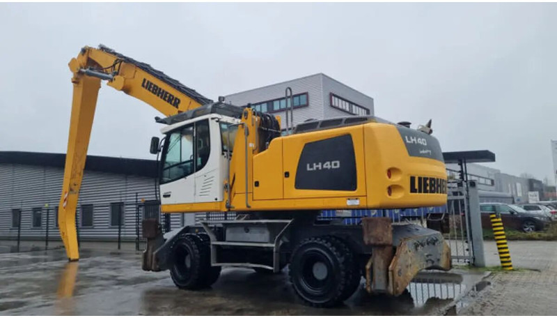 Liebherr LH40 M - Atkritumu iekrāvējs: foto 1 Liebherr LH40 M - Atkritumu iekrāvējs: foto 1