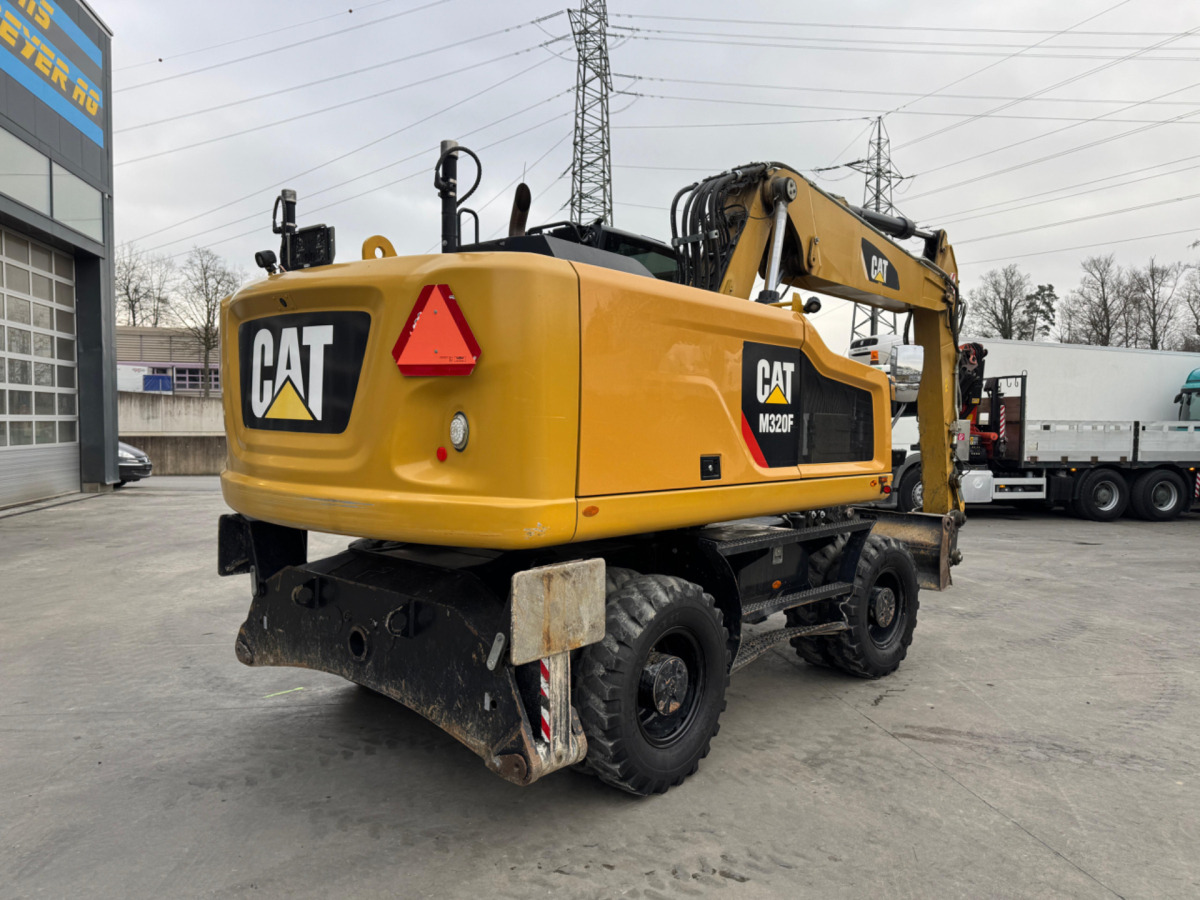 CATERPILLAR M320F Oilquick - Riteņu ekskavators: foto 4 CATERPILLAR M320F Oilquick - Riteņu ekskavators: foto 4