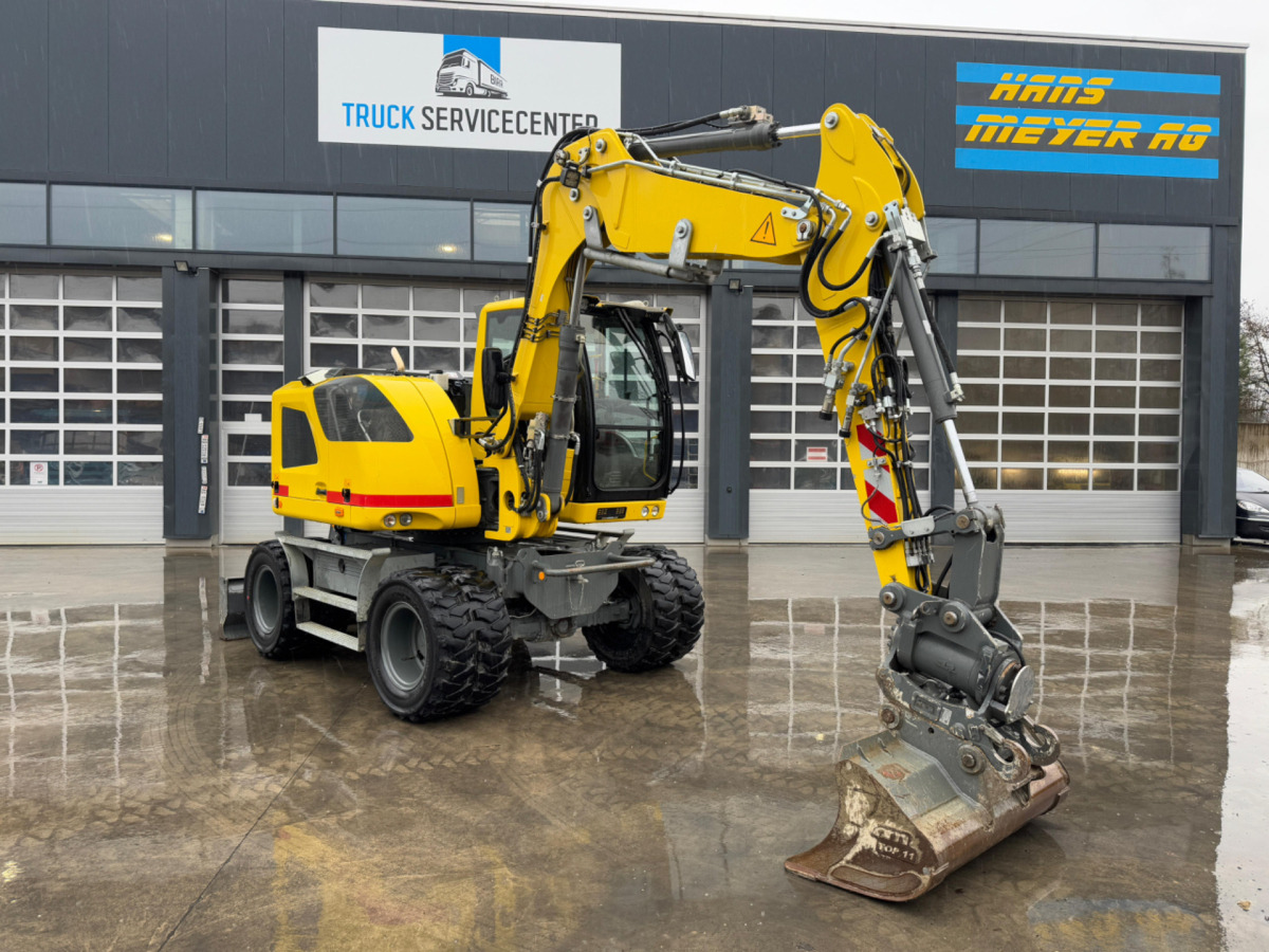 LIEBHERR 910 Compact Litronic Powertilt - Riteņu ekskavators: foto 2 LIEBHERR 910 Compact Litronic Powertilt - Riteņu ekskavators: foto 2