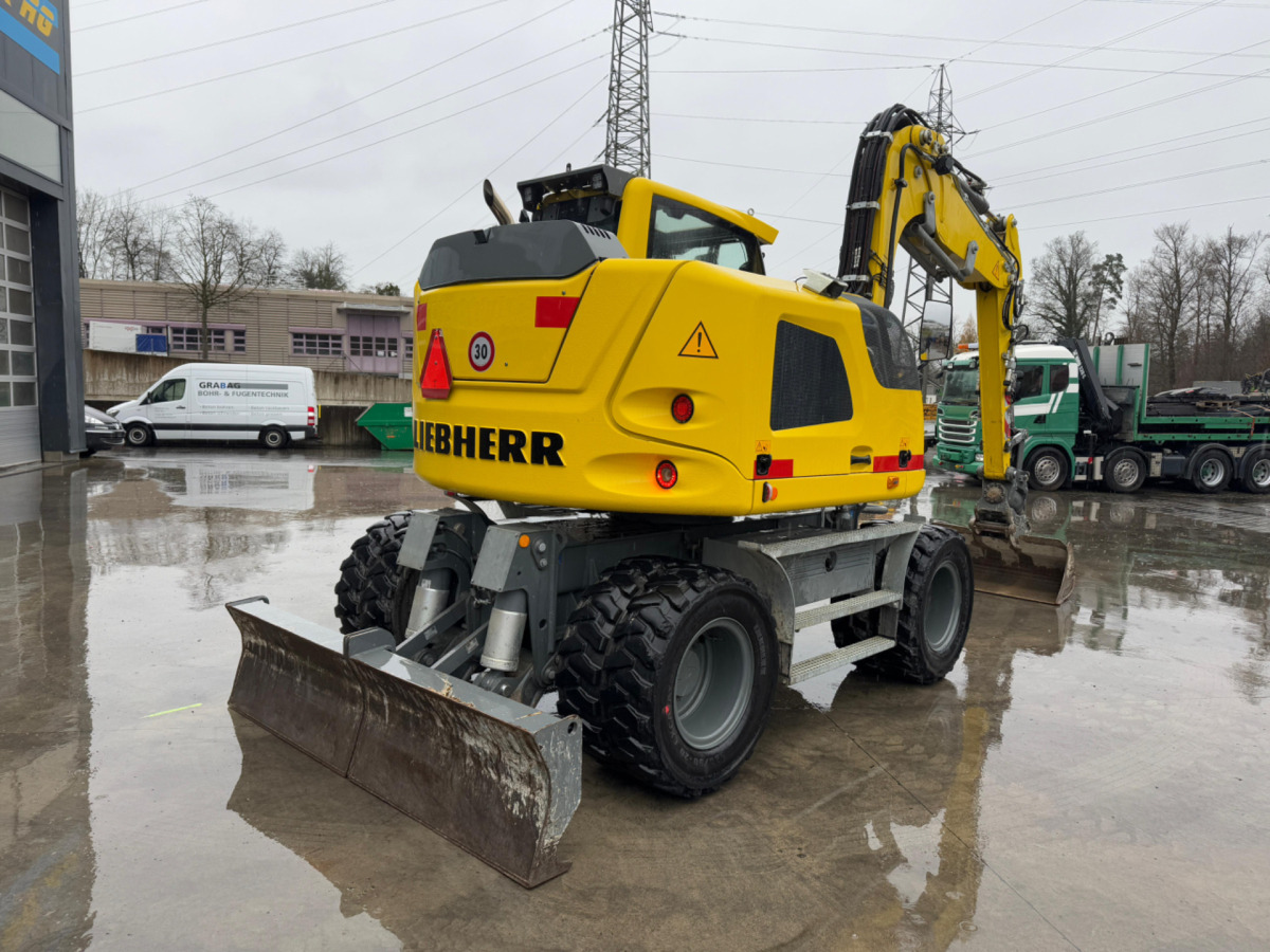 LIEBHERR 910 Compact Litronic Powertilt - Riteņu ekskavators: foto 4 LIEBHERR 910 Compact Litronic Powertilt - Riteņu ekskavators: foto 4