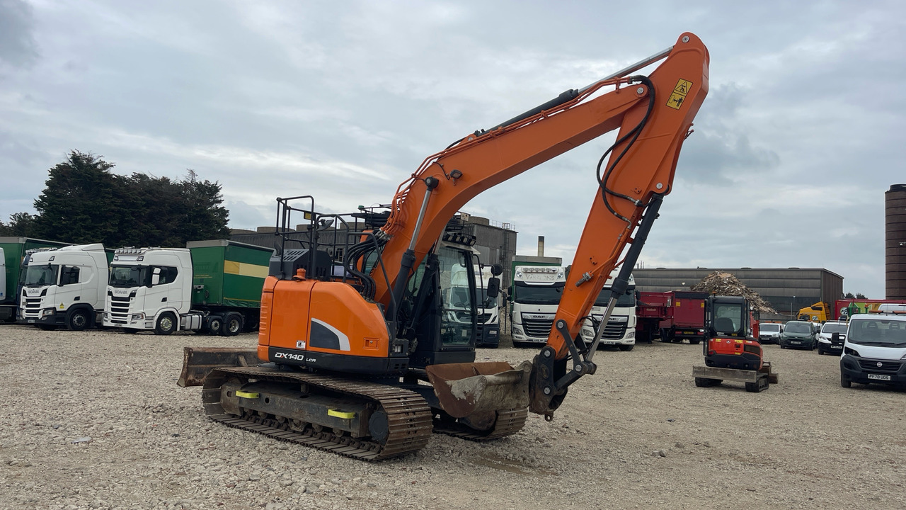 DOOSAN DX140LCR-5 - Kāpurķēžu ekskavators: foto 1 DOOSAN DX140LCR-5 - Kāpurķēžu ekskavators: foto 1