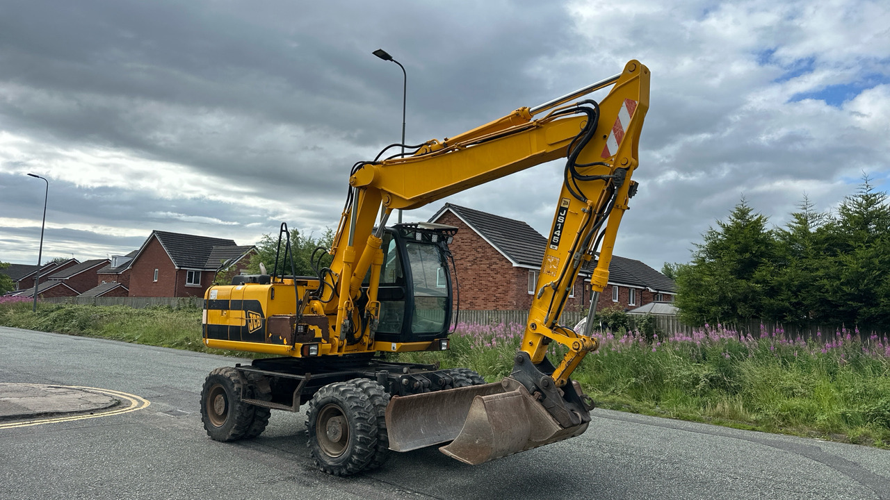 JCB - Riteņu ekskavators: foto 1 JCB - Riteņu ekskavators: foto 1