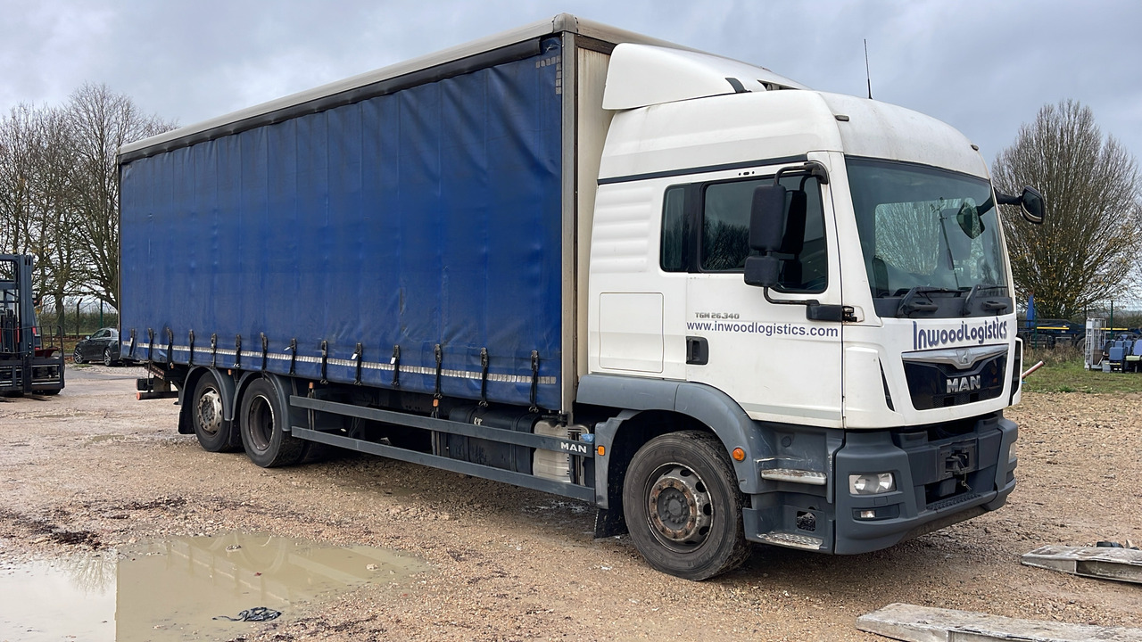 MAN TGM 26.340 - Kravas automašīna ar tentu: foto 1 MAN TGM 26.340 - Kravas automašīna ar tentu: foto 1