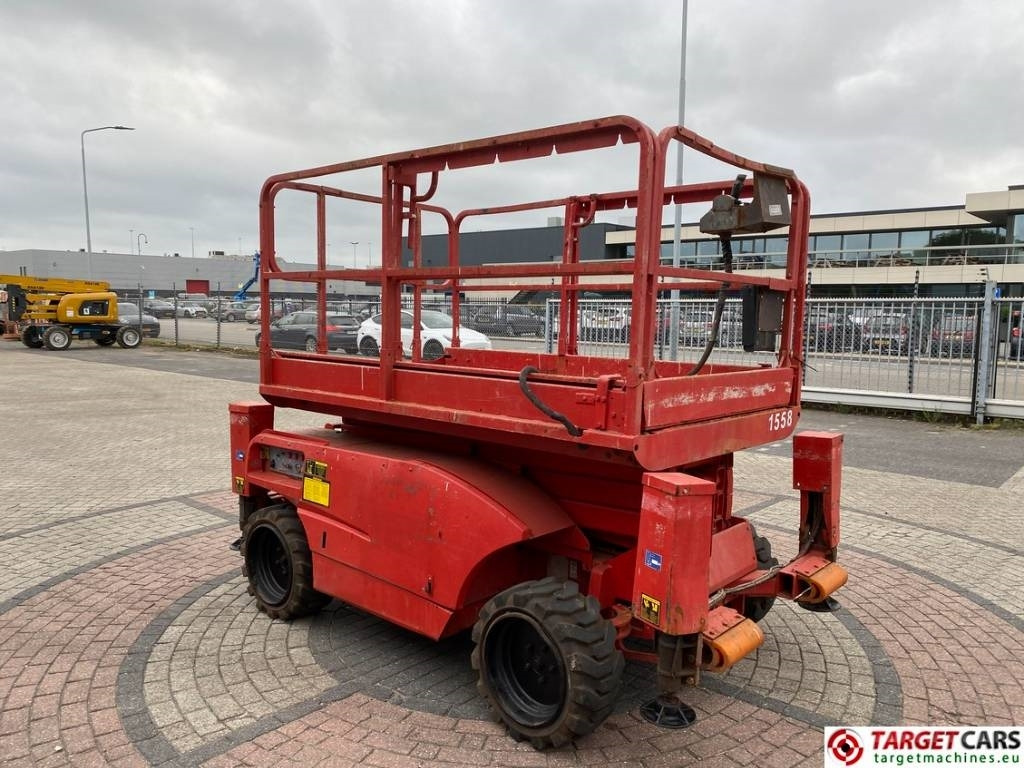 Haulotte Compact 10DX Diesel 4x4 Scissor Work Lift 1015cm - Šķērveida pacēlājs: foto 2 Haulotte Compact 10DX Diesel 4x4 Scissor Work Lift 1015cm - Šķērveida pacēlājs: foto 2