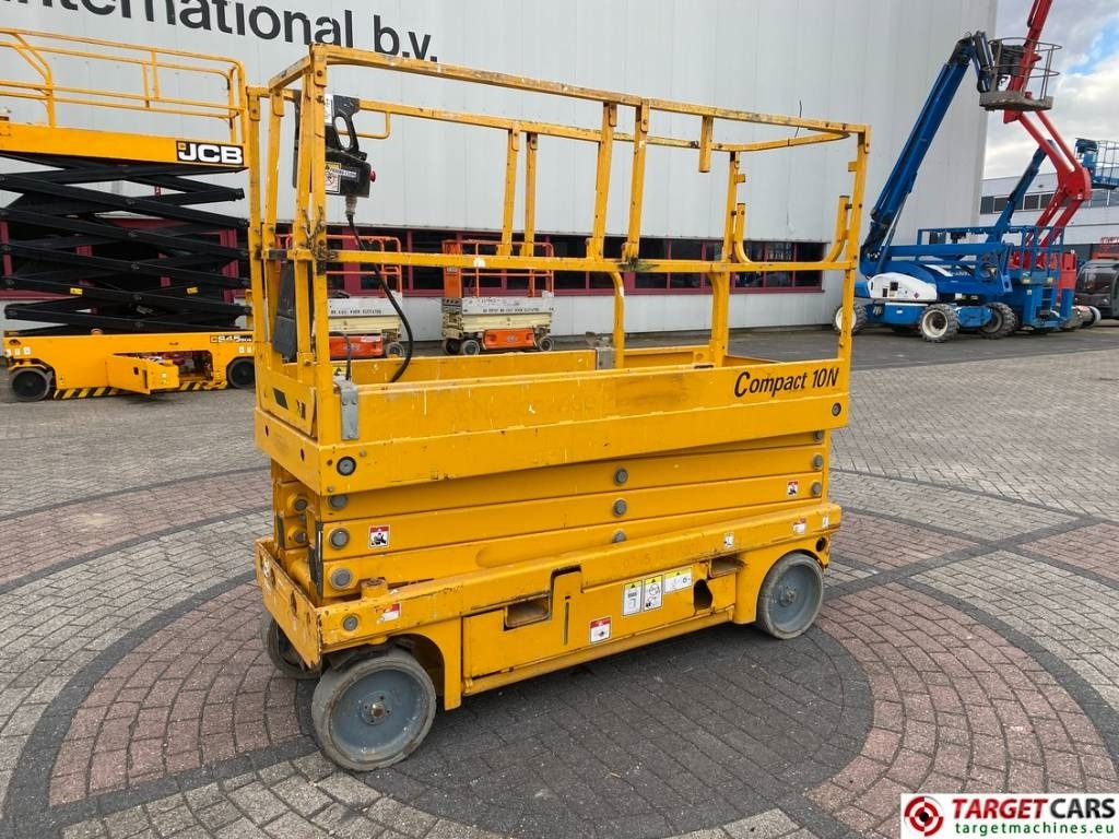Haulotte Compact 10N Electric Scissor Work Lift 1000cm - Šķērveida pacēlājs: foto 1 Haulotte Compact 10N Electric Scissor Work Lift 1000cm - Šķērveida pacēlājs: foto 1
