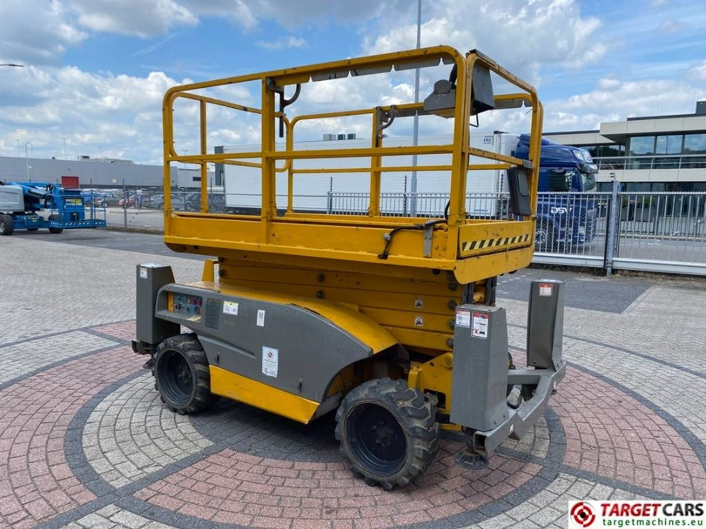 Haulotte Compact 12DX Diesel 4x4 Scissor Work Lift 1206cm - Šķērveida pacēlājs: foto 2 Haulotte Compact 12DX Diesel 4x4 Scissor Work Lift 1206cm - Šķērveida pacēlājs: foto 2