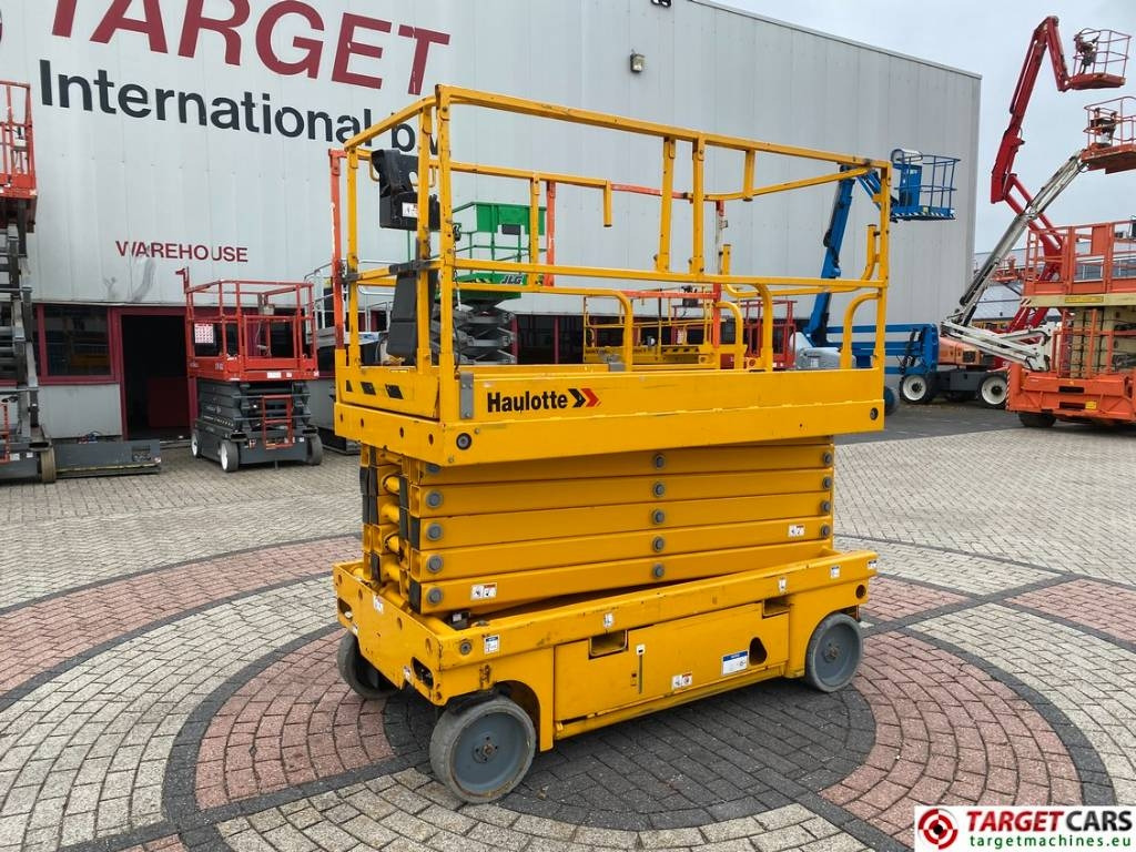 Haulotte Compact 14 Electric Scissor Work Lift 1385cm  - Šķērveida pacēlājs: foto 1 Haulotte Compact 14 Electric Scissor Work Lift 1385cm  - Šķērveida pacēlājs: foto 1