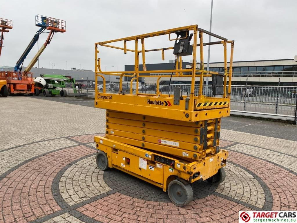 Haulotte Compact 14 Electric Scissor Work Lift 1385cm  - Šķērveida pacēlājs: foto 2 Haulotte Compact 14 Electric Scissor Work Lift 1385cm  - Šķērveida pacēlājs: foto 2