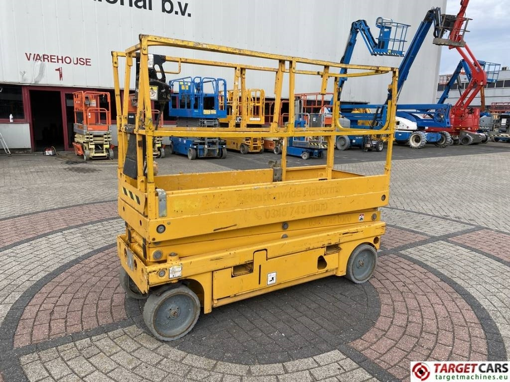 Haulotte Compact 8 Electric Scissor Work Lift 818cm  - Šķērveida pacēlājs: foto 1 Haulotte Compact 8 Electric Scissor Work Lift 818cm  - Šķērveida pacēlājs: foto 1