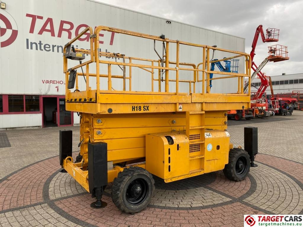 Haulotte H18SDX Diesel H18SX Scissor 4x4 Work Lift 1800cm  - Šķērveida pacēlājs: foto 1 Haulotte H18SDX Diesel H18SX Scissor 4x4 Work Lift 1800cm  - Šķērveida pacēlājs: foto 1