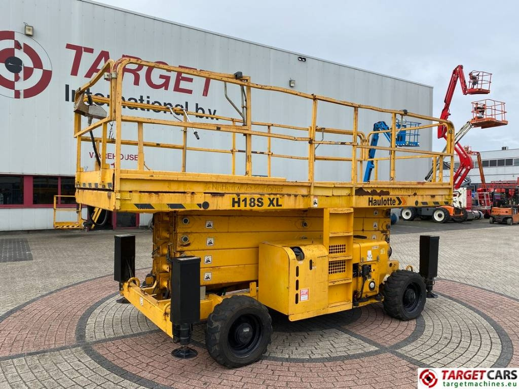 Haulotte H18SXL Diesel 4x4 Scissor Work Lift 1800cm - Šķērveida pacēlājs: foto 1 Haulotte H18SXL Diesel 4x4 Scissor Work Lift 1800cm - Šķērveida pacēlājs: foto 1