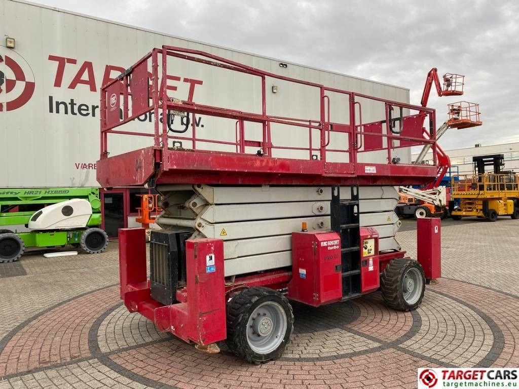 MEC 6092RT Diesel 4x4 Scissor Work Lift 2020cm - Šķērveida pacēlājs: foto 1 MEC 6092RT Diesel 4x4 Scissor Work Lift 2020cm - Šķērveida pacēlājs: foto 1