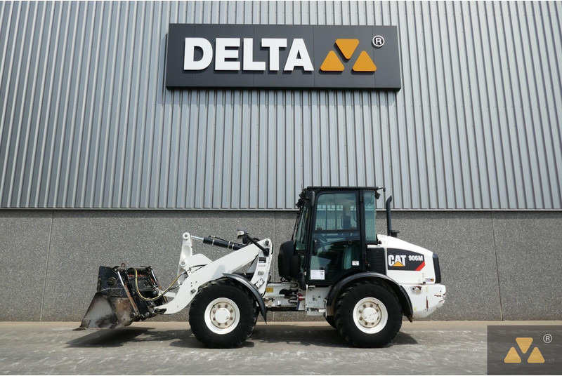 Caterpillar 906M - Riteņu iekrāvējs: foto 1 Caterpillar 906M - Riteņu iekrāvējs: foto 1