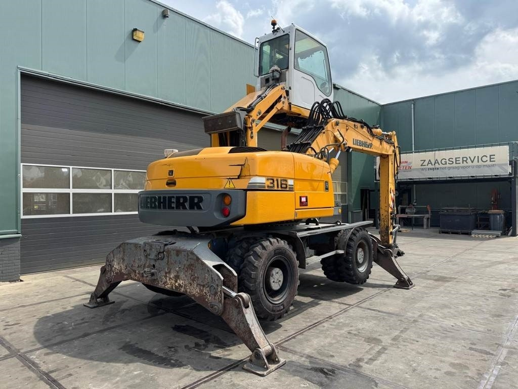 Liebherr A 316 - Atkritumu iekrāvējs: foto 4 Liebherr A 316 - Atkritumu iekrāvējs: foto 4