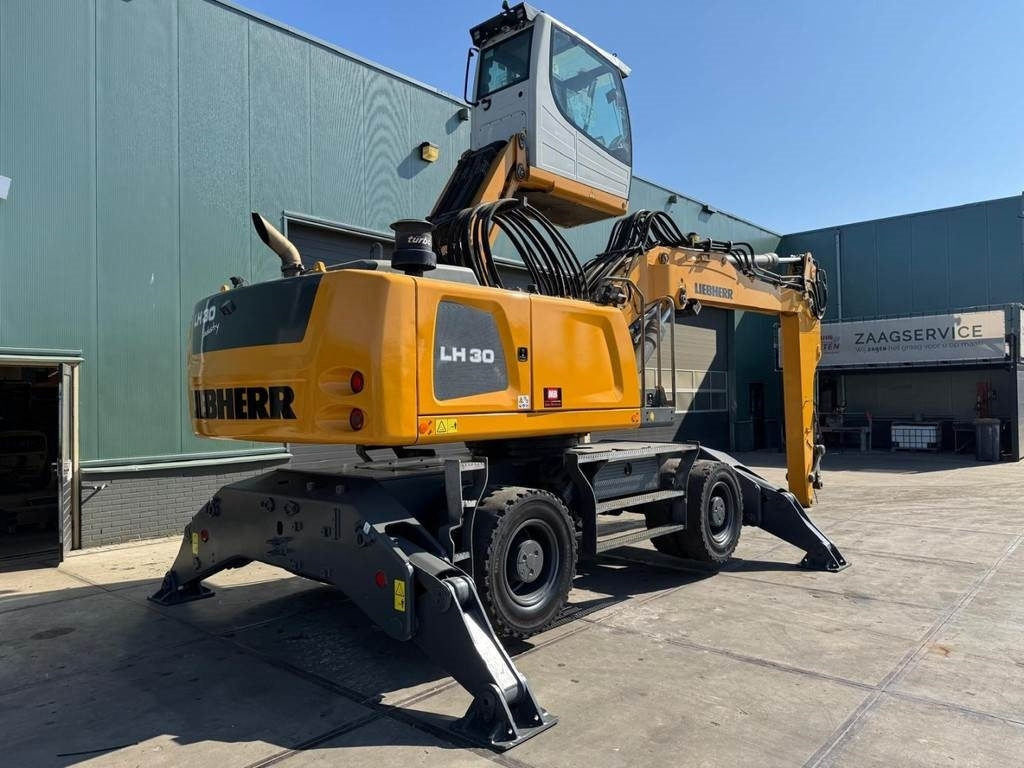 Liebherr LH 30 M - Atkritumu iekrāvējs: foto 5 Liebherr LH 30 M - Atkritumu iekrāvējs: foto 5