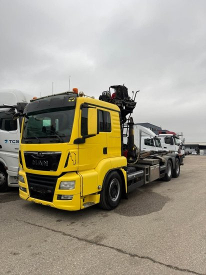 MAN TGS 26.500 6x2, Palfinger-Abrollkipper mit Kran, Lenk-Liftachse, Euro 6 - Pacēlājs ar āķi, Kravas auto ar manipulatoru: foto 1 MAN TGS 26.500 6x2, Palfinger-Abrollkipper mit Kran, Lenk-Liftachse, Euro 6 - Pacēlājs ar āķi, Kravas auto ar manipulatoru: foto 1