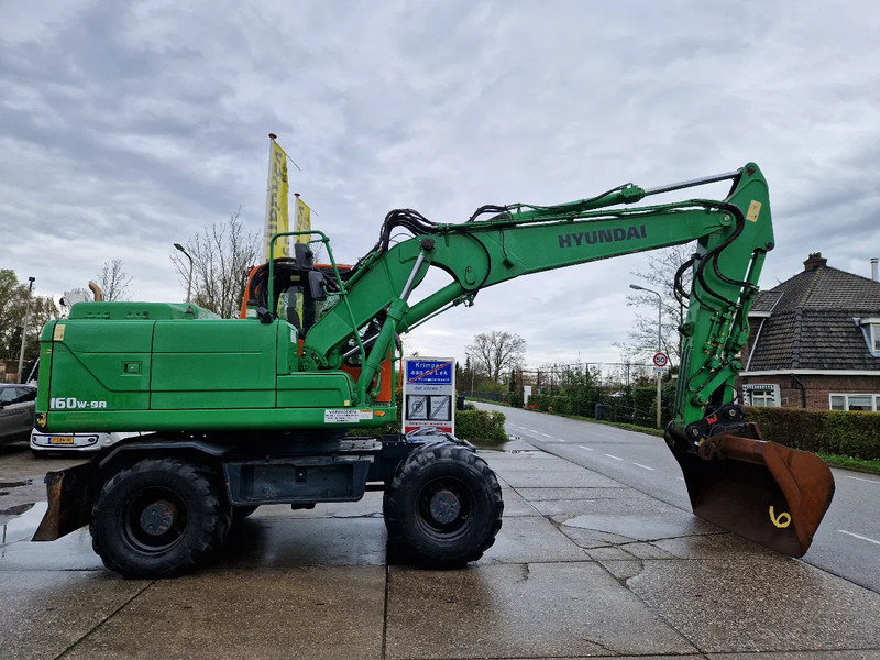 Hyundai Robex 160W-9A met 6-cilinder Cummins motor - Riteņu ekskavators: foto 2 Hyundai Robex 160W-9A met 6-cilinder Cummins motor - Riteņu ekskavators: foto 2