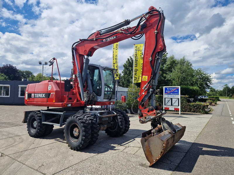 Terex TW160 inclusief kantelbak (1.98m.) - Riteņu ekskavators: foto 2 Terex TW160 inclusief kantelbak (1.98m.) - Riteņu ekskavators: foto 2