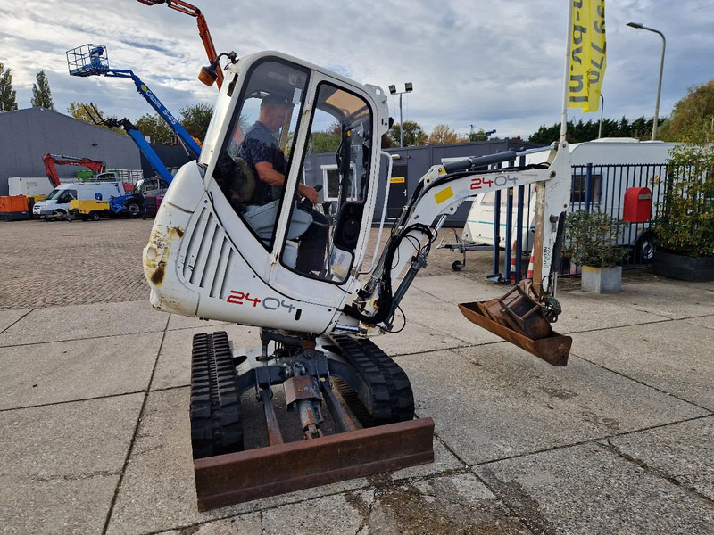 WACKER NEUSON 2404RD, kan op een berghelling draaien - Mini-ekskavators: foto 1 WACKER NEUSON 2404RD, kan op een berghelling draaien - Mini-ekskavators: foto 1