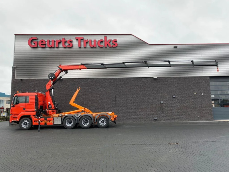 MAN TGS 35.480 8X4 TRIDEM + 20 TON HAAKARM + HMF 3220-K6 KRAAN/KRAN/CRANE/GRUA - Pacēlājs ar āķi, Kravas auto ar manipulatoru: foto 1 MAN TGS 35.480 8X4 TRIDEM + 20 TON HAAKARM + HMF 3220-K6 KRAAN/KRAN/CRANE/GRUA - Pacēlājs ar āķi, Kravas auto ar manipulatoru: foto 1
