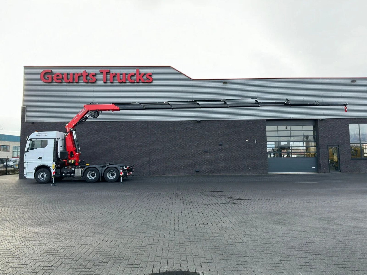 MAN TGX 33.520 6X4 TREKKER-BAKWAGEN COMBI + FASSI F4 - Kravas auto ar manipulatoru: foto 1 MAN TGX 33.520 6X4 TREKKER-BAKWAGEN COMBI + FASSI F4 - Kravas auto ar manipulatoru: foto 1