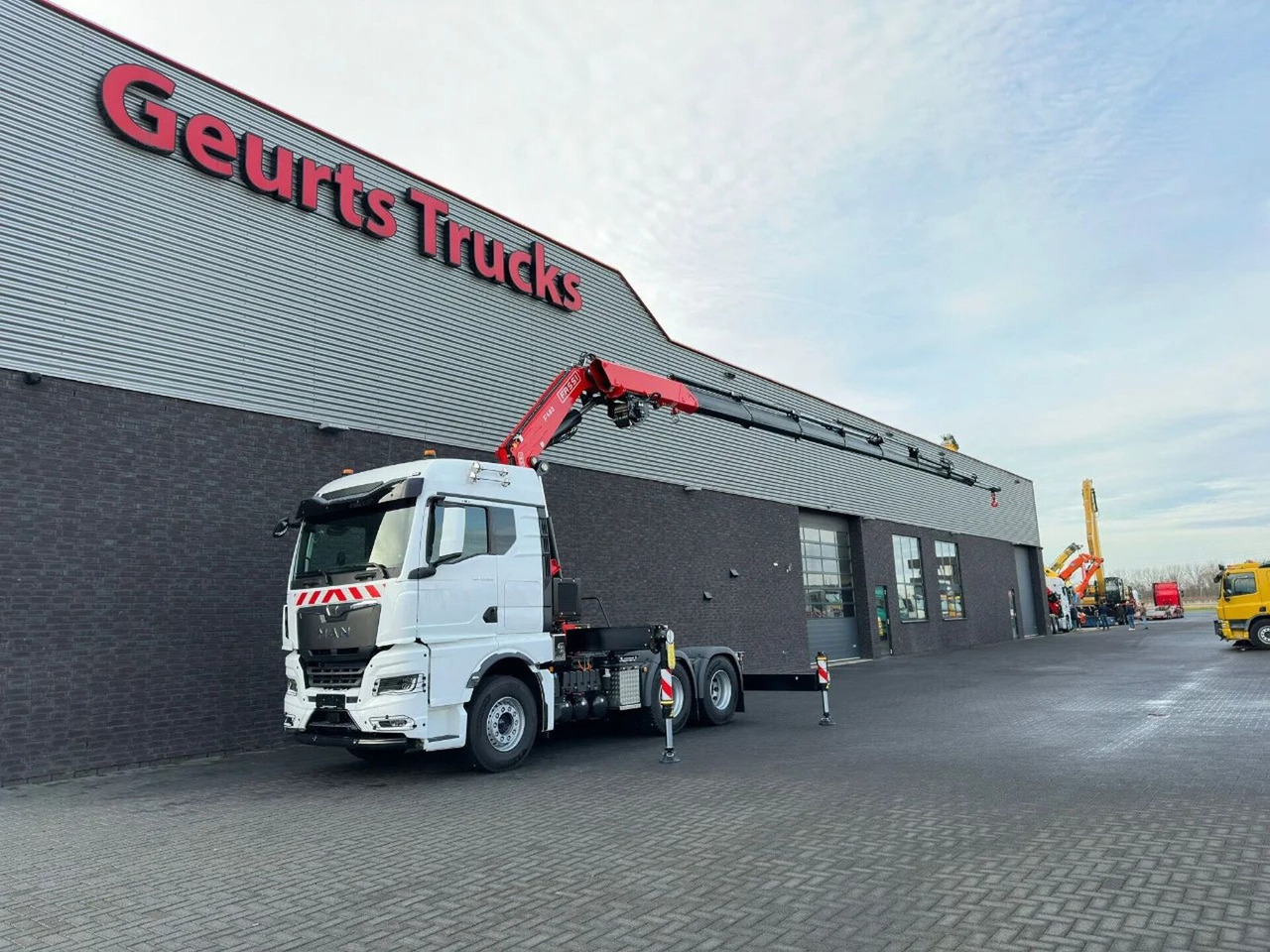 MAN TGX 33.520 6X4 TREKKER-BAKWAGEN COMBI + FASSI F4 - Kravas auto ar manipulatoru: foto 2 MAN TGX 33.520 6X4 TREKKER-BAKWAGEN COMBI + FASSI F4 - Kravas auto ar manipulatoru: foto 2