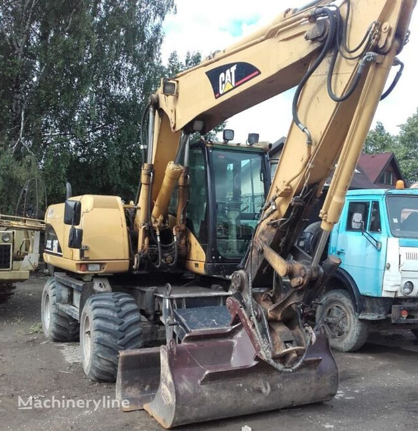 Caterpillar M313C - Riteņu ekskavators: foto 3 Caterpillar M313C - Riteņu ekskavators: foto 3