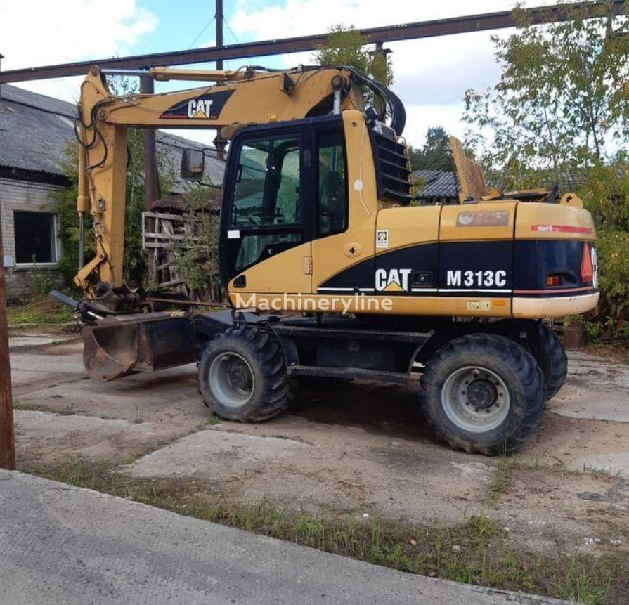 Caterpillar M313C - Riteņu ekskavators: foto 4 Caterpillar M313C - Riteņu ekskavators: foto 4