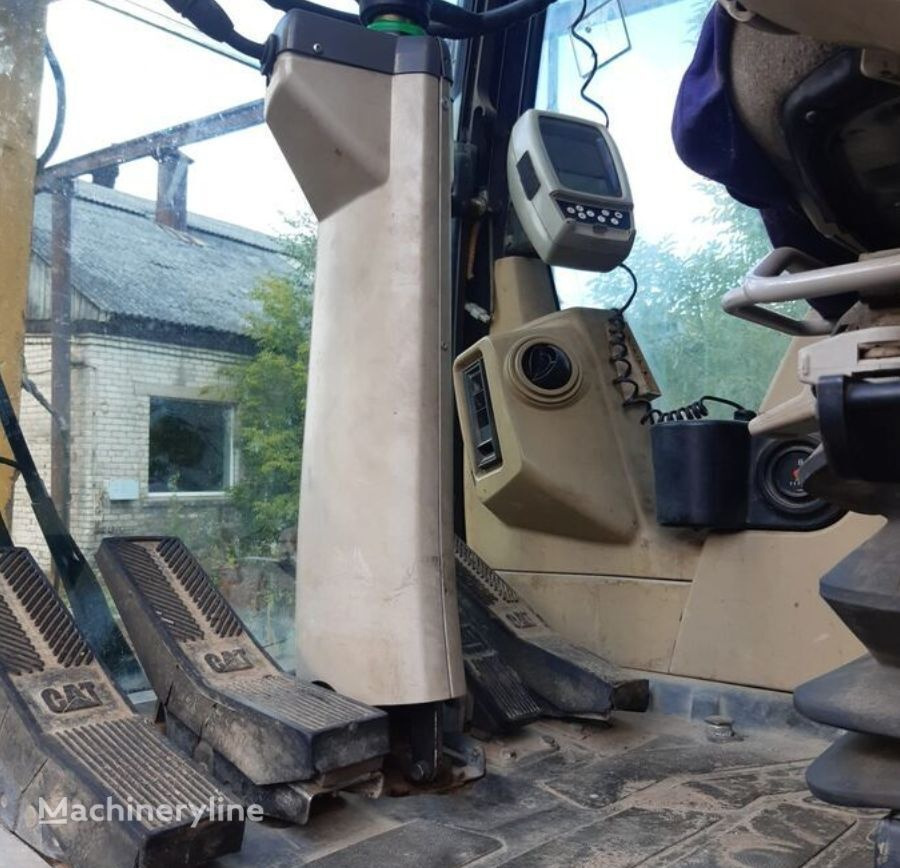 Caterpillar M313C - Riteņu ekskavators: foto 1 Caterpillar M313C - Riteņu ekskavators: foto 1