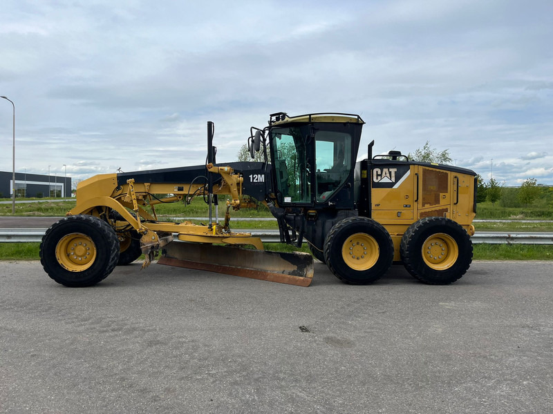 Caterpillar 12M Motor Grader - Greiders: foto 1 Caterpillar 12M Motor Grader - Greiders: foto 1