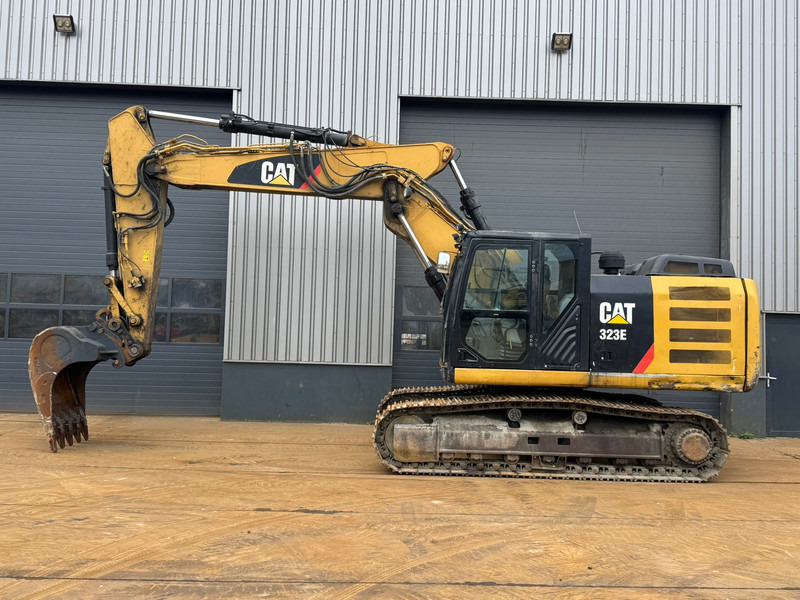 Caterpillar 323E - Kāpurķēžu ekskavators: foto 1 Caterpillar 323E - Kāpurķēžu ekskavators: foto 1