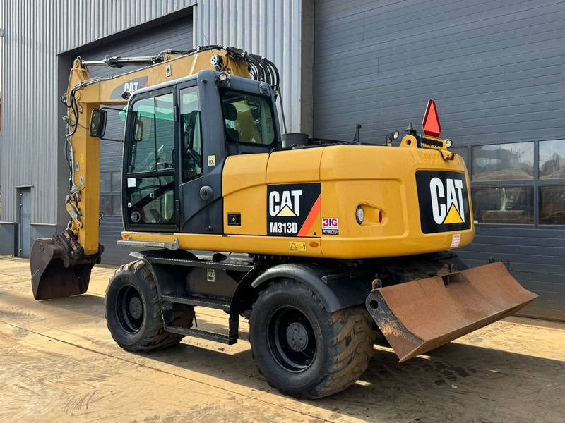 Caterpillar M313D - CE - Riteņu ekskavators: foto 3 Caterpillar M313D - CE - Riteņu ekskavators: foto 3