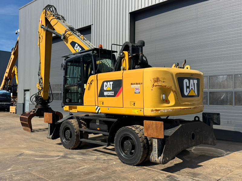 Caterpillar MH3022 - Atkritumu iekrāvējs: foto 4 Caterpillar MH3022 - Atkritumu iekrāvējs: foto 4