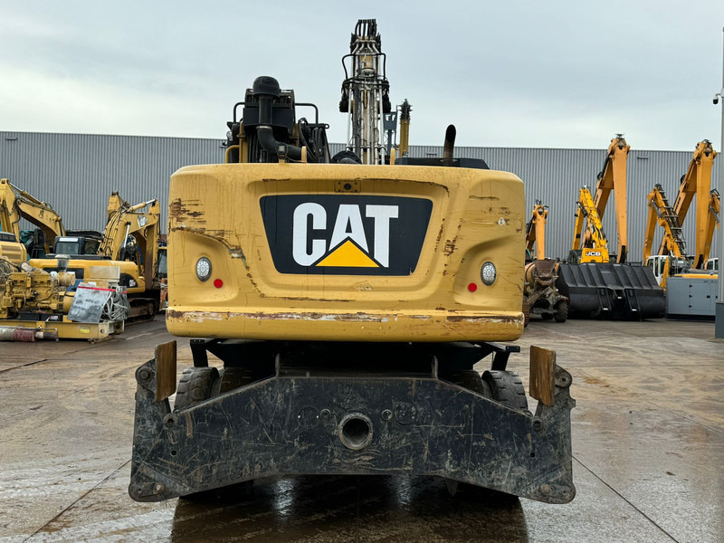 Caterpillar MH3022 - Atkritumu iekrāvējs: foto 4 Caterpillar MH3022 - Atkritumu iekrāvējs: foto 4