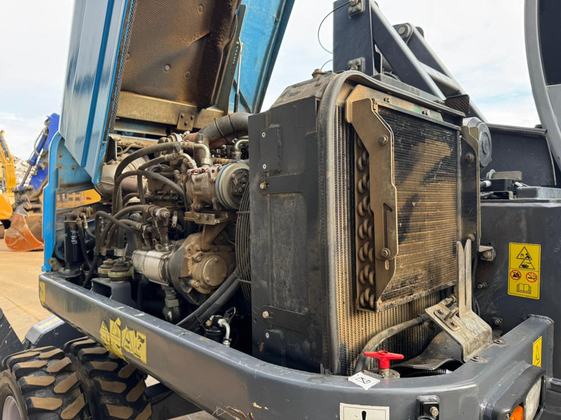 Atkritumu iekrāvējs Fuchs MHL 250: foto 19 Atkritumu iekrāvējs Fuchs MHL 250: foto 19