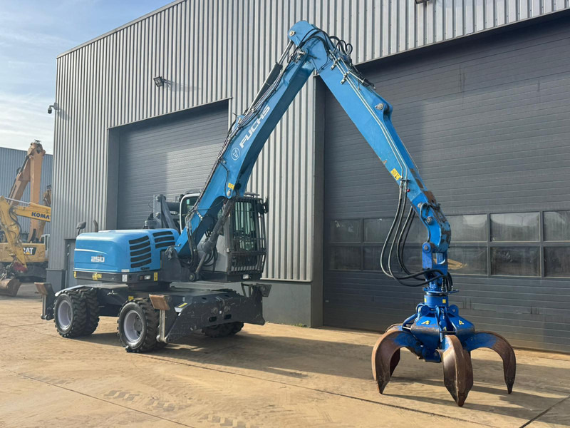 Atkritumu iekrāvējs Fuchs MHL 250: foto 8 Atkritumu iekrāvējs Fuchs MHL 250: foto 8