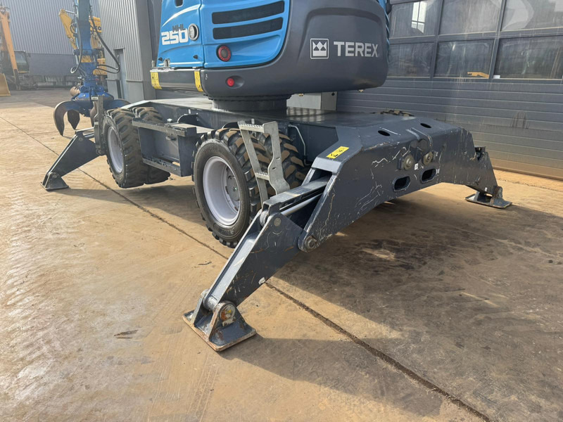 Atkritumu iekrāvējs Fuchs MHL 250: foto 15 Atkritumu iekrāvējs Fuchs MHL 250: foto 15