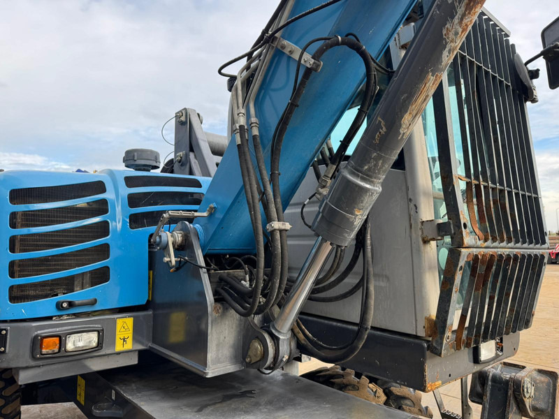 Atkritumu iekrāvējs Fuchs MHL 250: foto 17 Atkritumu iekrāvējs Fuchs MHL 250: foto 17