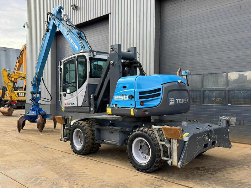 Atkritumu iekrāvējs Fuchs MHL 250: foto 6 Atkritumu iekrāvējs Fuchs MHL 250: foto 6