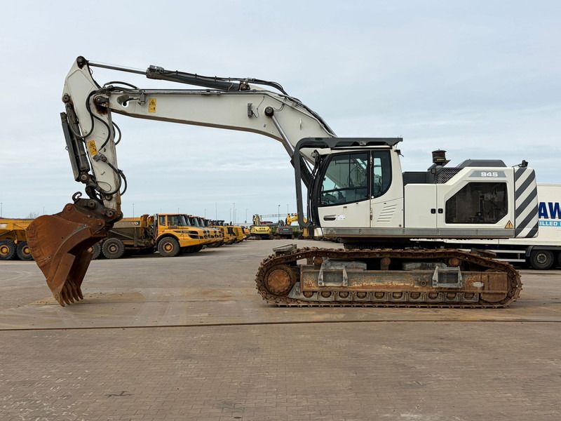 Liebherr R945 LCV (R944 / R946 / R950) - Kāpurķēžu ekskavators: foto 1 Liebherr R945 LCV (R944 / R946 / R950) - Kāpurķēžu ekskavators: foto 1